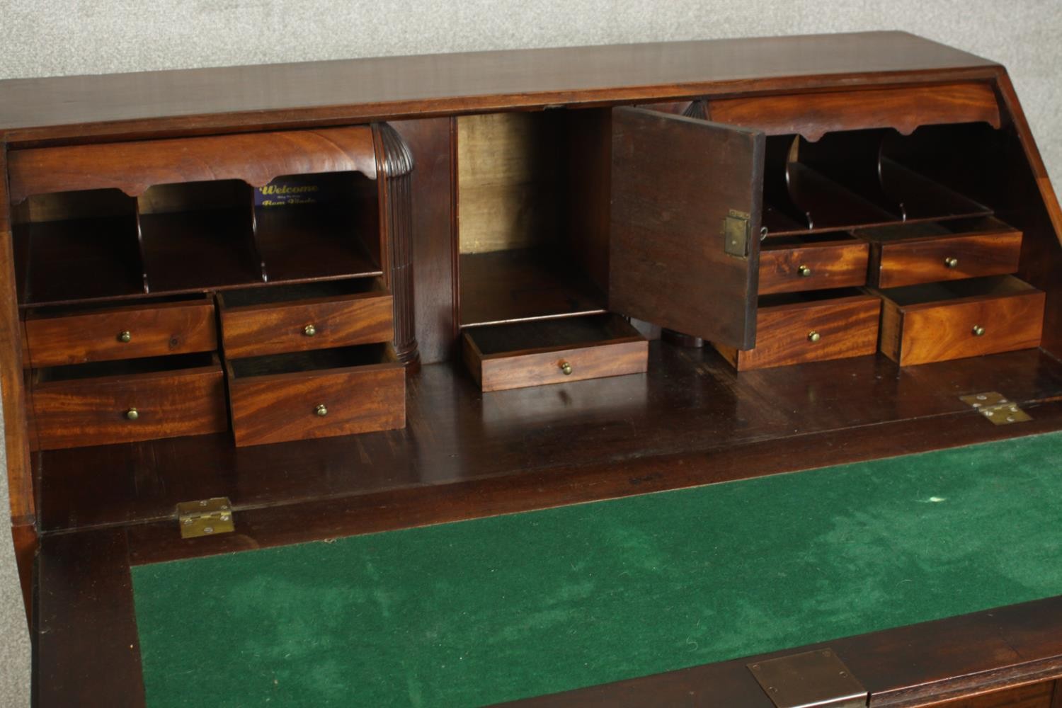 A 19th century mahogany bureau, the fall front enclosing a green writing surface with an arrangement - Image 9 of 12