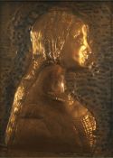 A framed and glazed copper relief artwork of a woman in a head scarf, signed Hudorovich. H.55 W.45cm