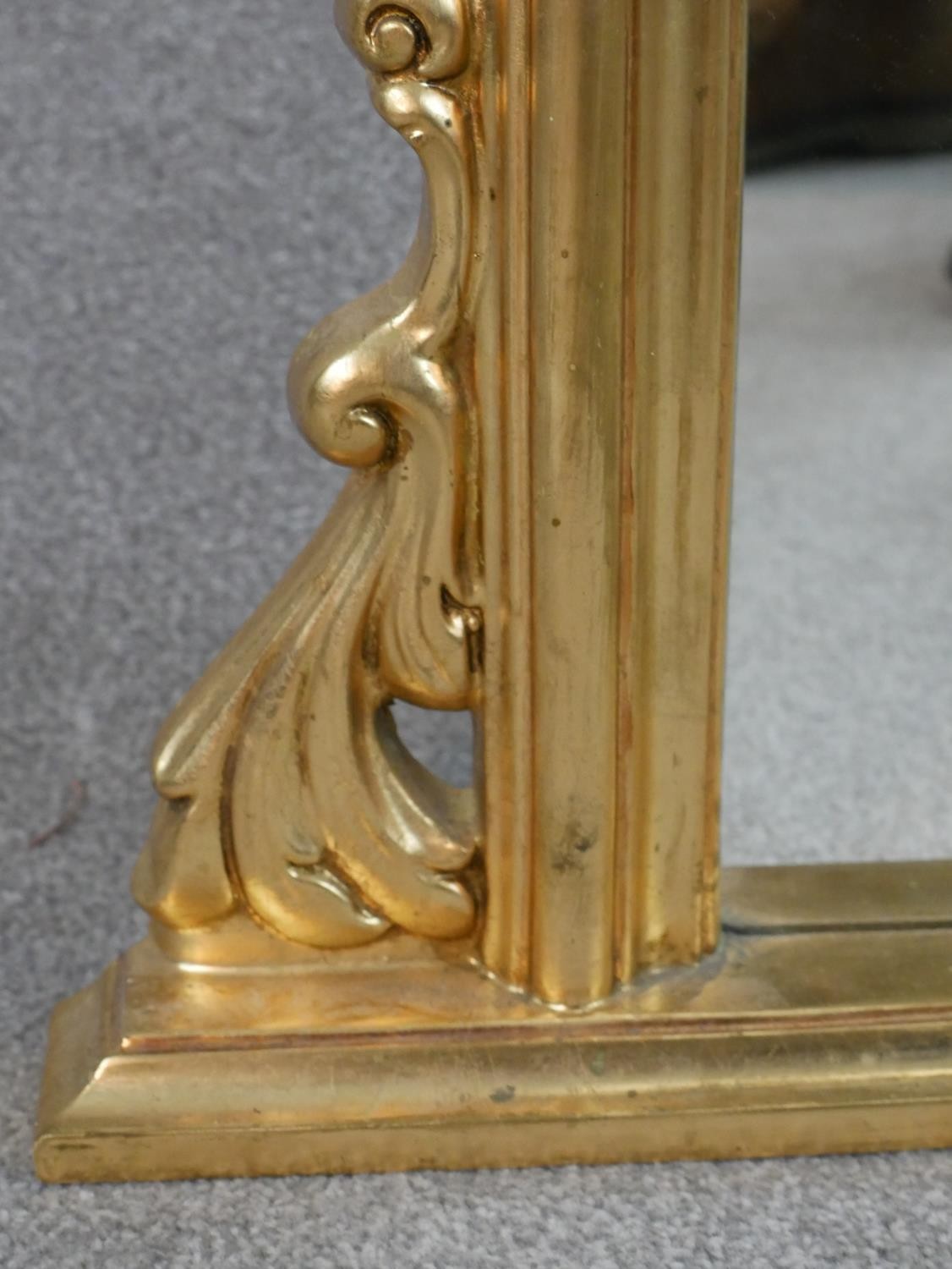 A contemporary Victorian style gilt framed overmantel mirror with a rounded top, flanked by carved - Image 3 of 4