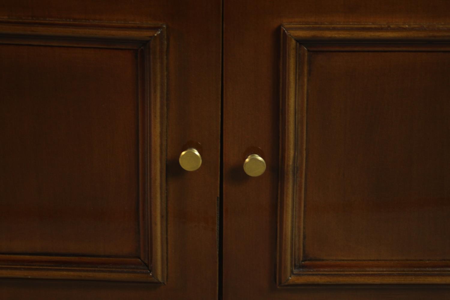 A late 20th century side cabinet, the rectangular top with a moulded edge supported by turned and - Image 10 of 10