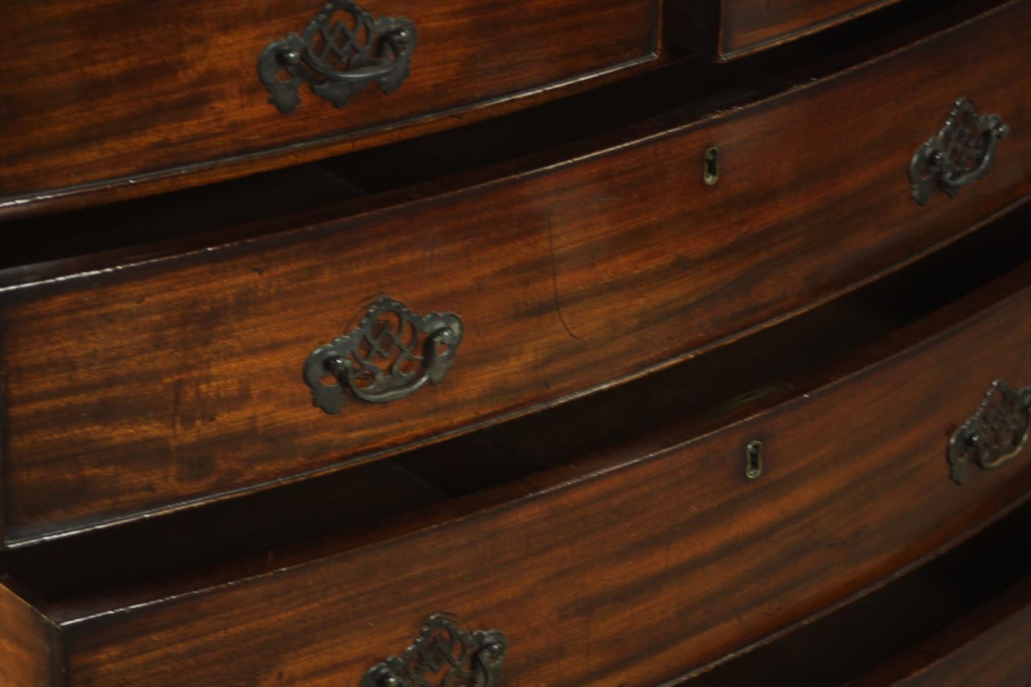 A George III bowfronted mahogany chest of two short over three long drawers above a shaped apron and - Image 7 of 8