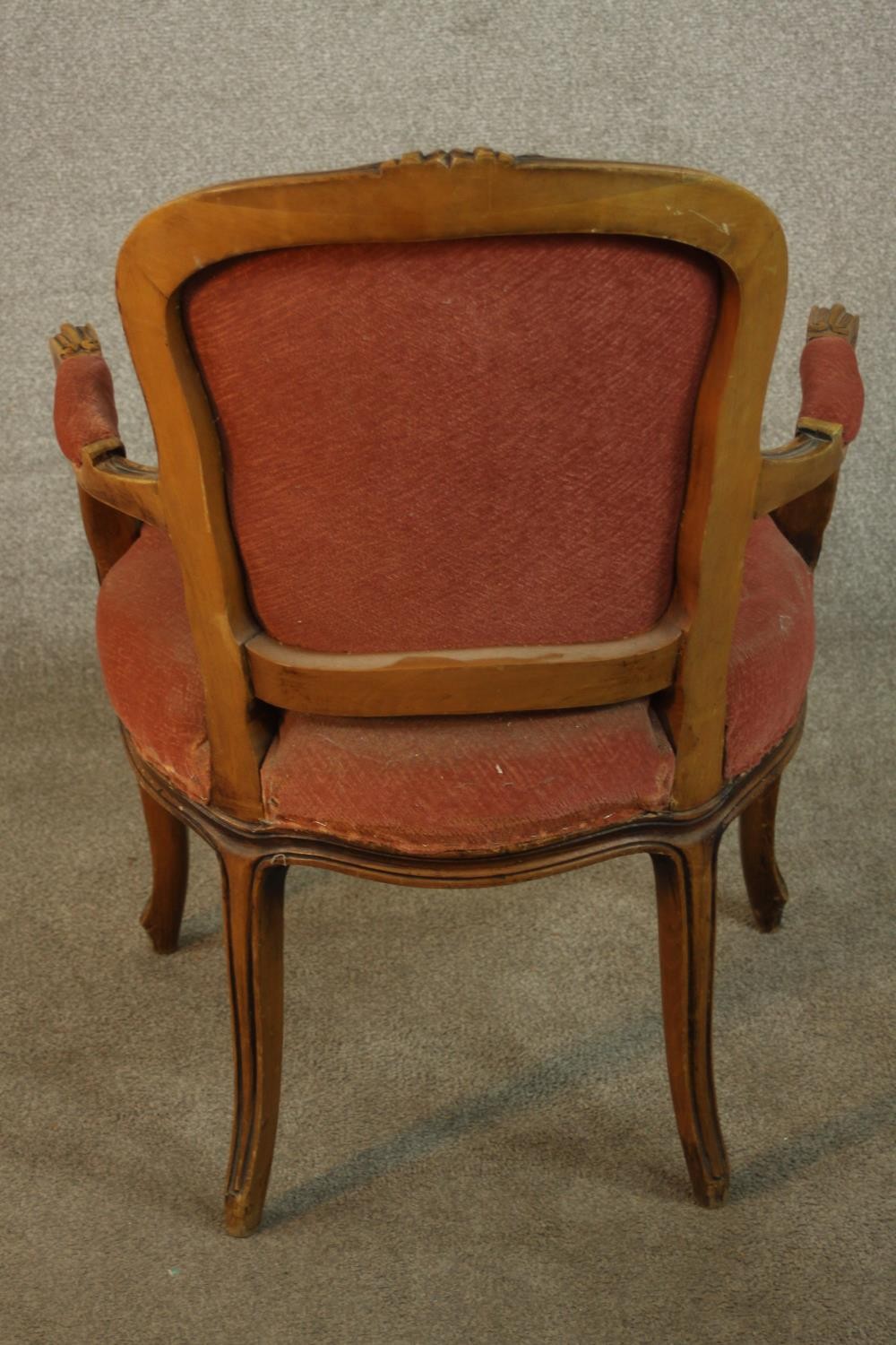 A French Louis XV style fauteuil armchair, upholstered in dark pink fabric on cabriole legs, - Image 9 of 9