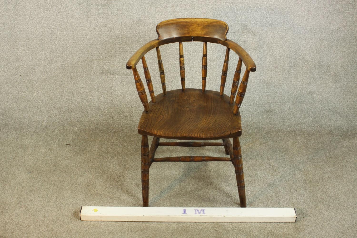 A 19th century captain's tub chair, the back on ring turned spindles, over an elm seat, on ring - Image 2 of 5