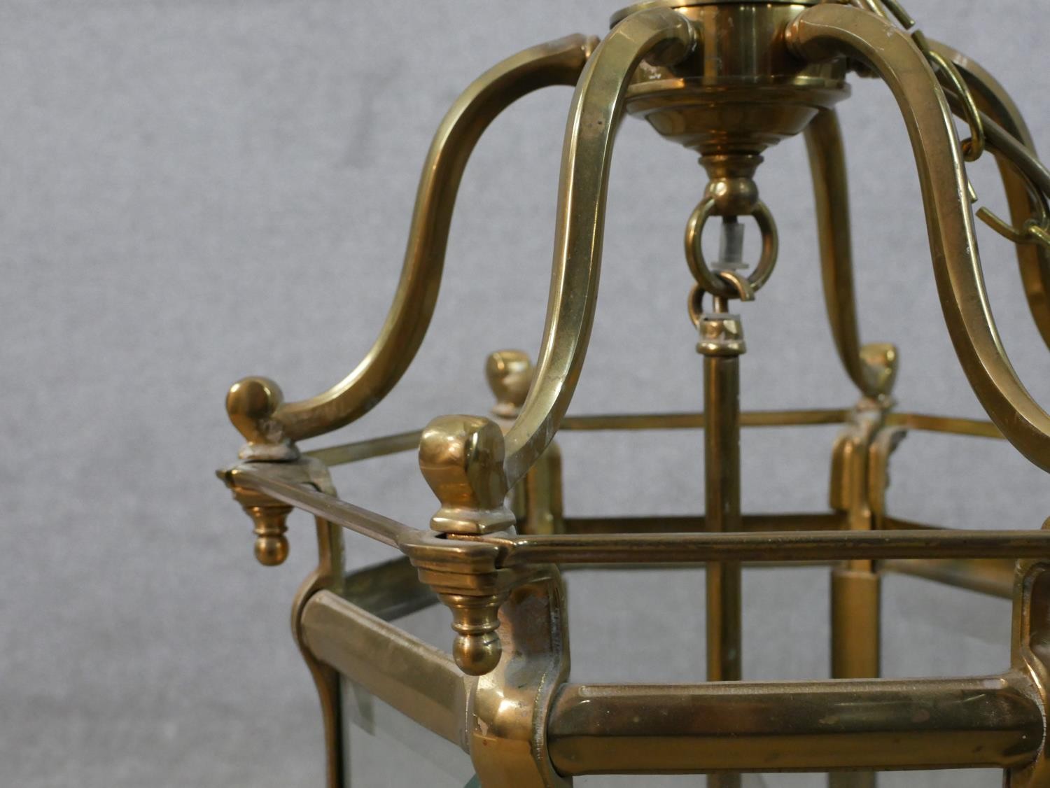 A 20th century brass framed and bevelled glass hexagonal hall lantern. H.56 W.37 D.37cm - Image 3 of 5