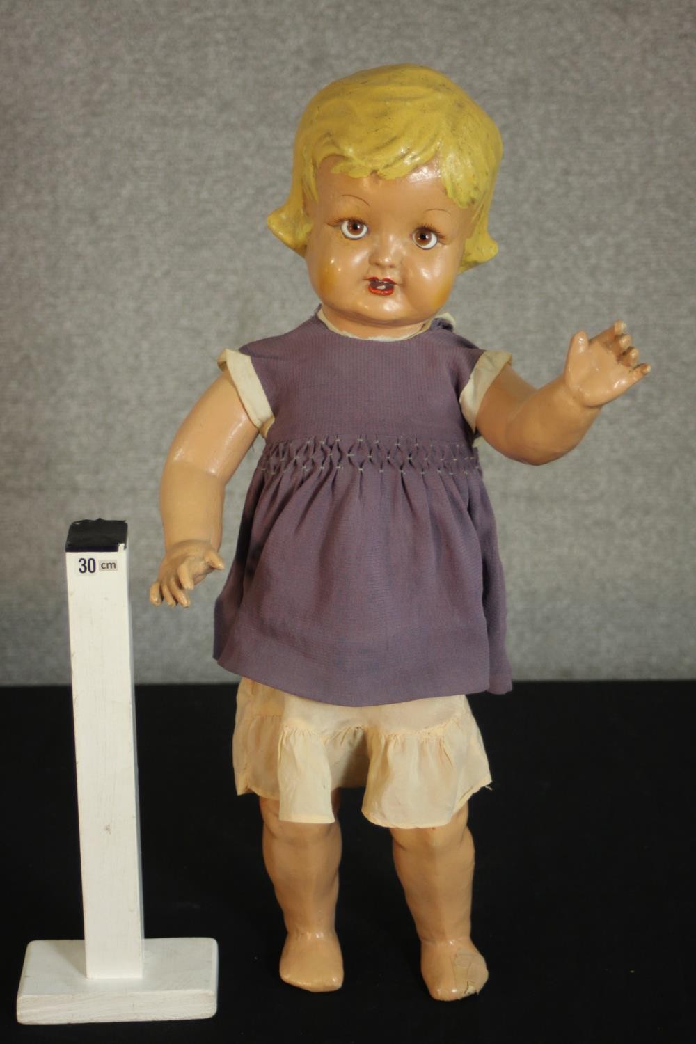 A late 19th century-early 20th century painted papier mache doll with glass eyes and voice box. (not - Image 2 of 9