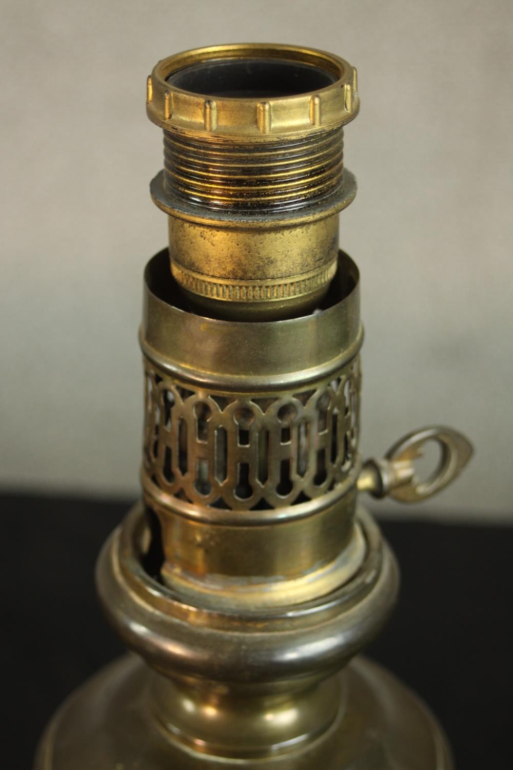 A Victorian brass geometric design gimbal candle stick turned table lamp along with a brass oil lamp - Image 9 of 14