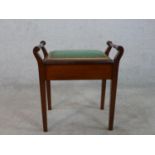 A Victorian mahogany framed piano stool raised on square tapering supports, H.56 W.53 D.35cm
