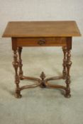 A 17th century style walnut side table, the rectangular top with a moulded edge over a single