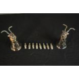 Two silver plated goat head hunting cups along with eight silver plated duck menu holders. H.12.5