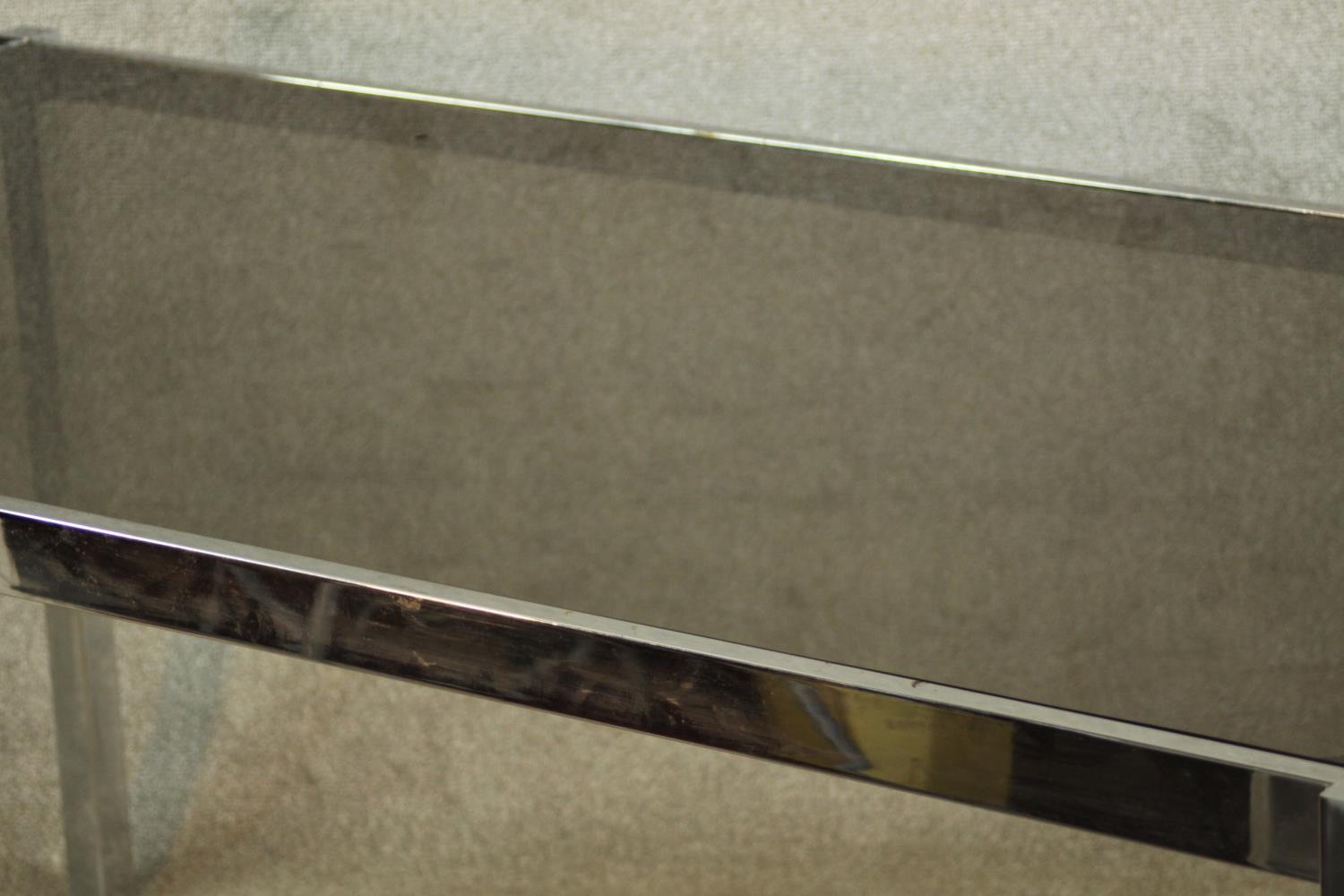 A 1970's dining table with a smoked plate glass top on a square section tubular chrome frame. H.74 - Image 7 of 7