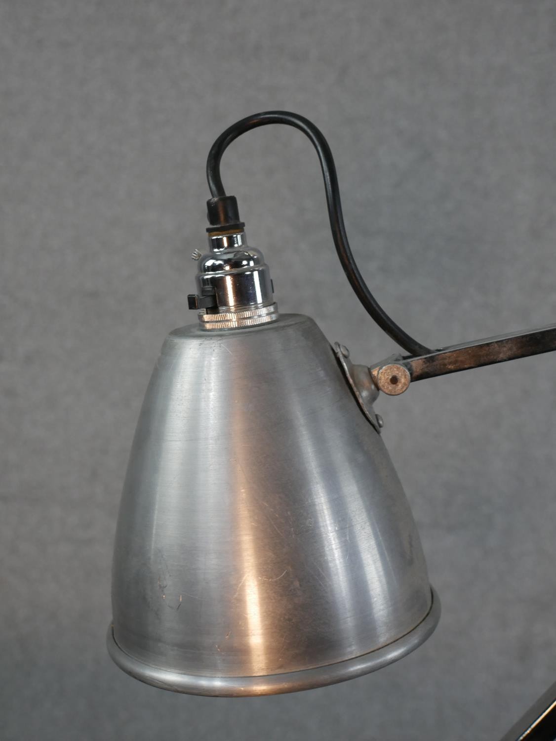 A Pair of brushed steel angle poise lamps, raised on square plinth base. H.49 W.36cm - Image 4 of 6