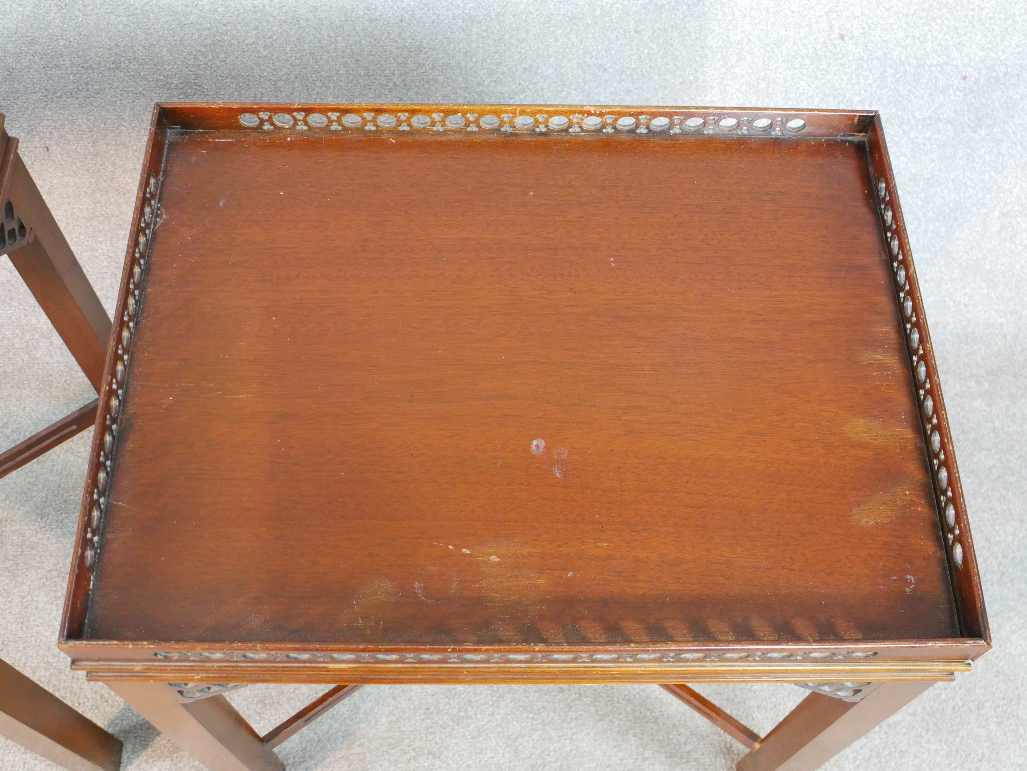 A pair of reporoduction mahogany lamp tables in Chippendale style, of rectangular form with a - Image 3 of 7