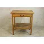 An early 20th century Cooke's (Finsbury) Ltd side table, with a single drawer over an undertier,