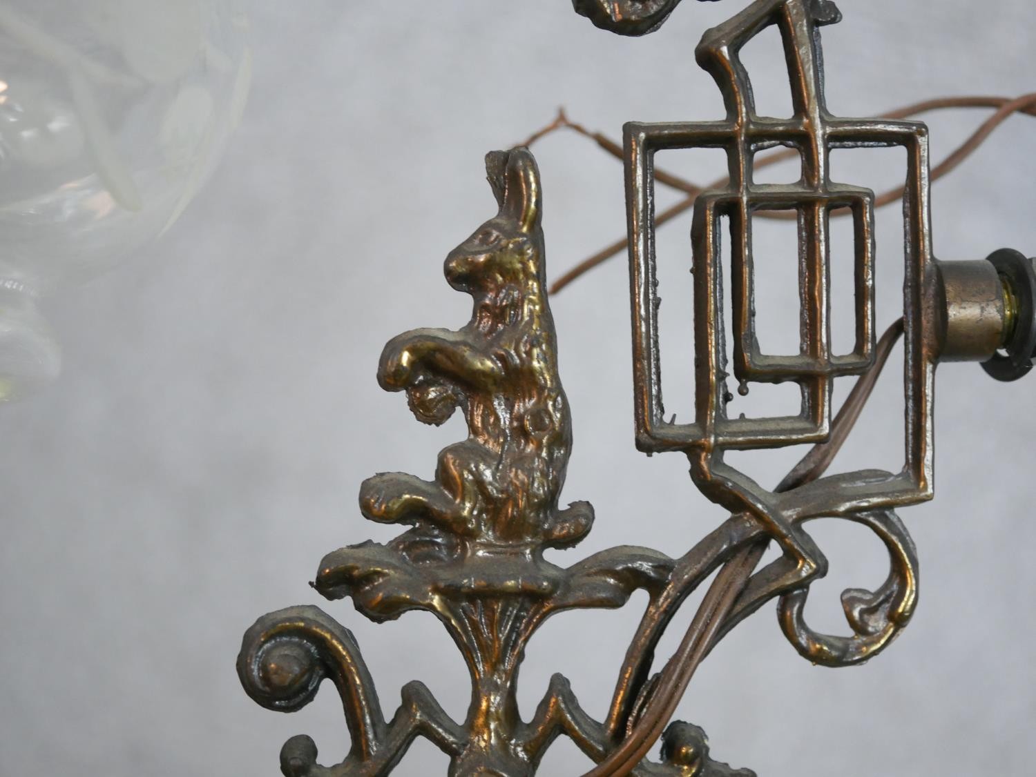 A set of three Edwardian cast metal wall lights, the ornate branches with hare decoration, with - Image 5 of 5