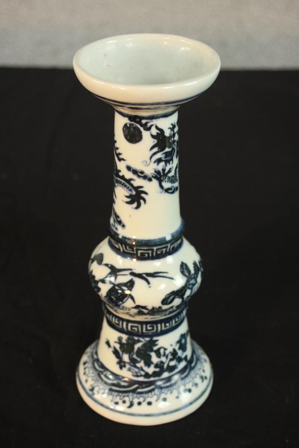 A Chinese blue and white porcelain candle holder painted with flying dragon and flaming pearl - Image 6 of 7