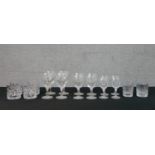 A collection of eighteen Stuart cut crystal glasses, including a set of four whisky tumblers and