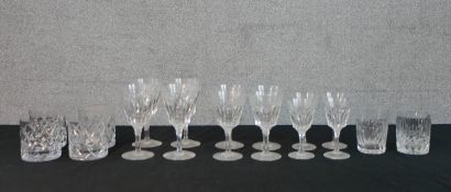 A collection of eighteen Stuart cut crystal glasses, including a set of four whisky tumblers and