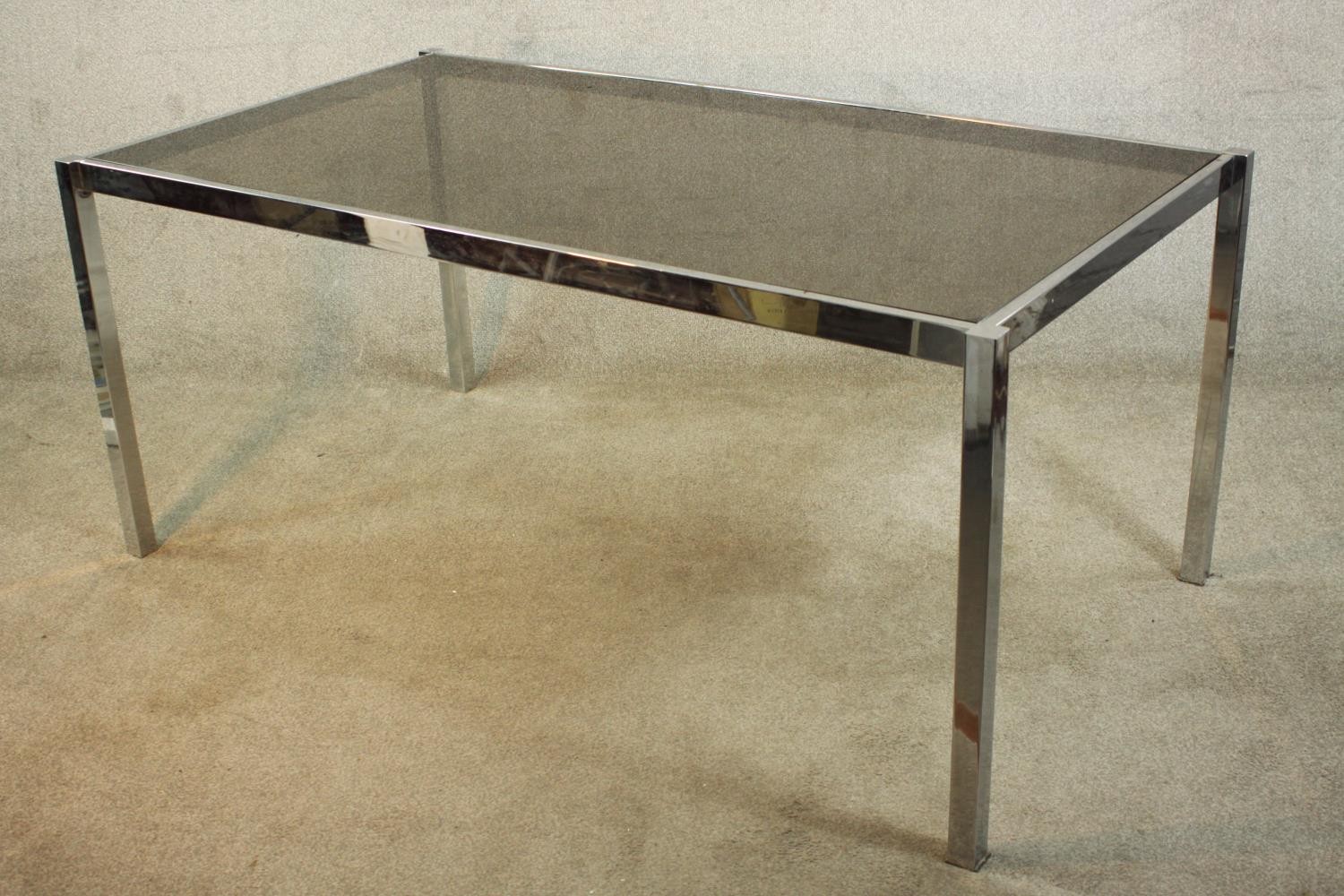 A 1970's dining table with a smoked plate glass top on a square section tubular chrome frame. H.74 - Image 6 of 7