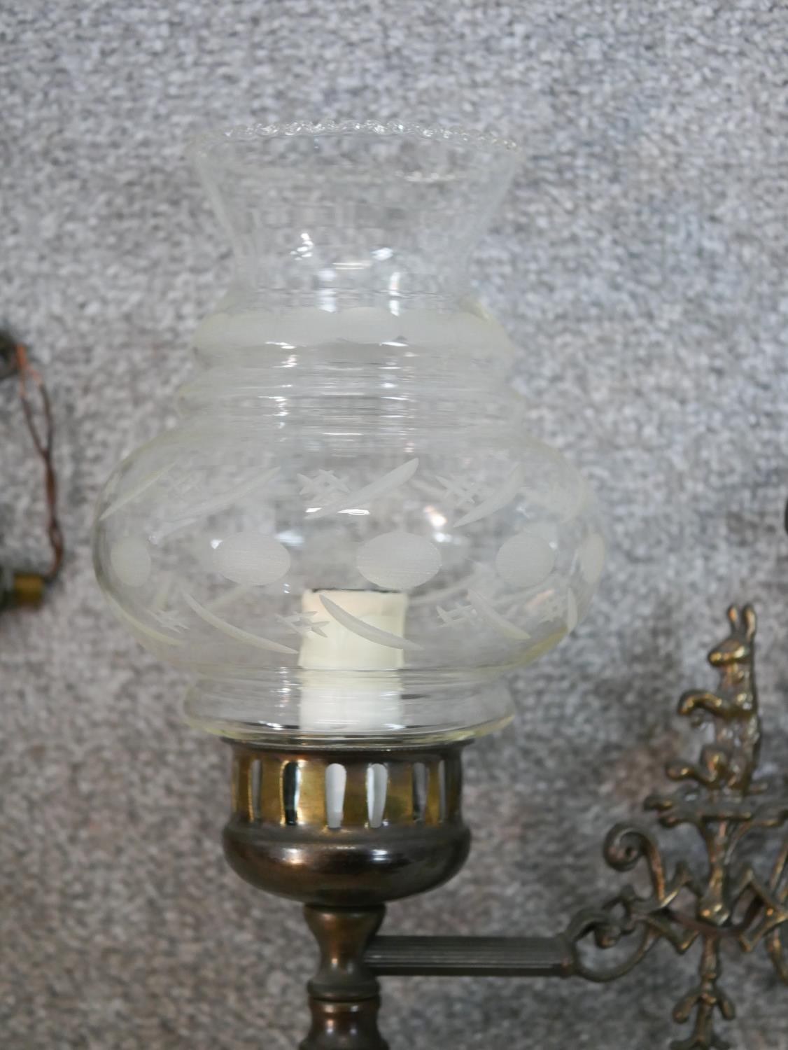 A set of three Edwardian cast metal wall lights, the ornate branches with hare decoration, with - Image 4 of 5