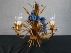 A 20th century gilt metal wheatsheaf chandelier, with five scrolling branches. H.49 W.55cm