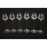 A set of six tall stemmed grappa glasses, signed to base. H.23 Dia.8cm. (each)