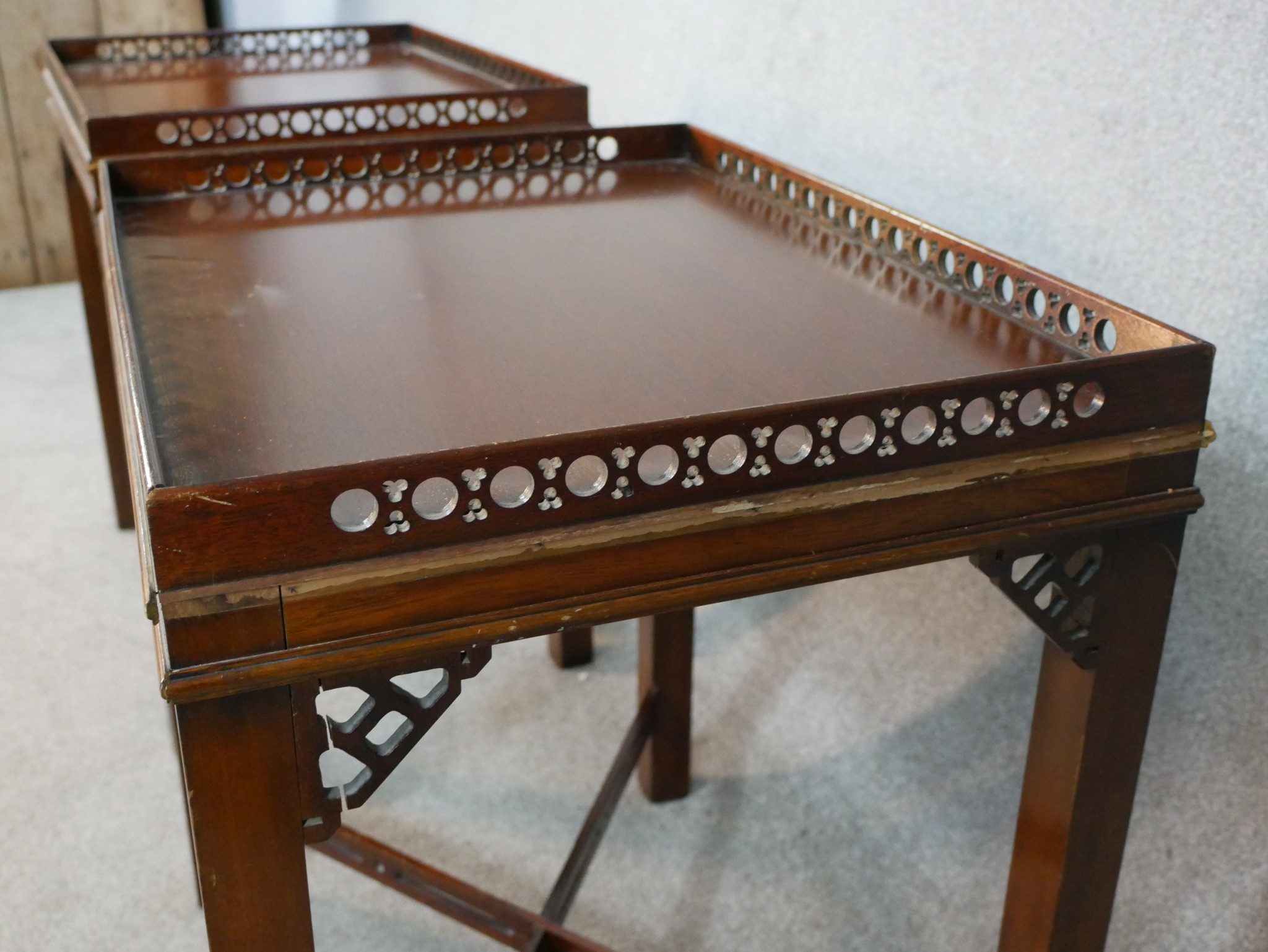 A pair of reporoduction mahogany lamp tables in Chippendale style, of rectangular form with a - Image 5 of 7