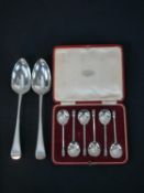 A pair of George III hallmarked silver table spoons; London 1802; 122g gross weight, 23cm long,