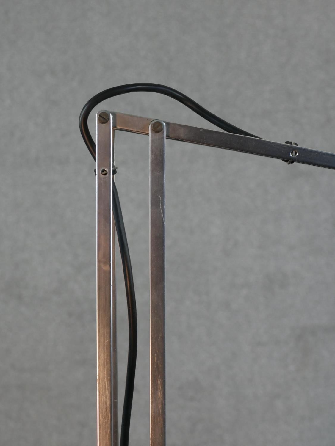 A brushed steel electric desk top angle poise style lamp, on circular foot. H.67 W.58cm - Image 3 of 7