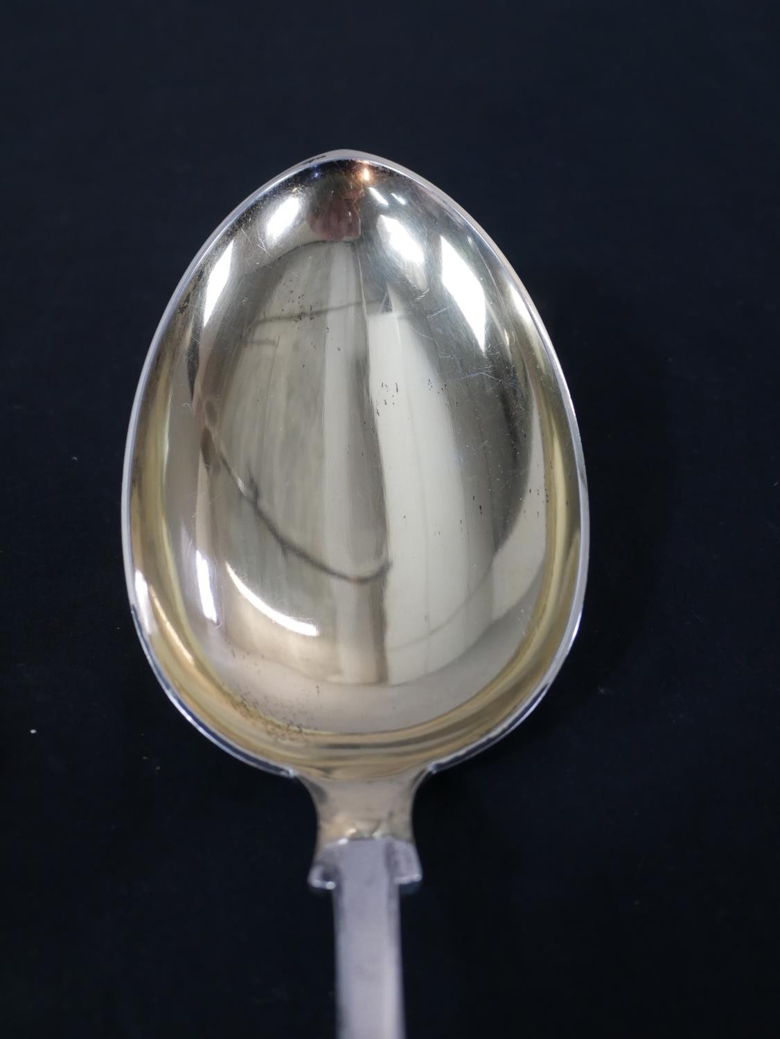 A large Danish white metal fiddle and shell pattern serving spoon, with gilded bowl, stamped J.G. - Image 3 of 5