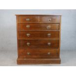 An Edwardian mahogany chest of two short over four graduating drawers, raised on plinth base. H.