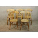 Set of five 20th century pine splat back dining / kitchen chairs raised on turned outswept