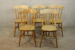 Set of five 20th century pine splat back dining / kitchen chairs raised on turned outswept