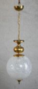 A Victorian style pendant light, with a Murano mottled globular glass shade and brass mounts. H.41