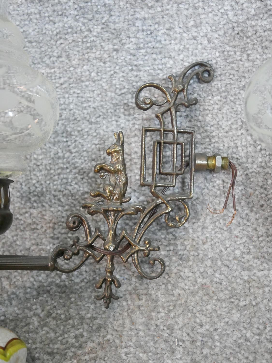 A set of three Edwardian cast metal wall lights, the ornate branches with hare decoration, with - Image 2 of 5