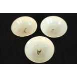 A set of three Chinese porcelain bowls, each with all over rooster decoration. H.6 Dia.17cm (each)