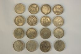 Assorted white metal World coins to include Chile United States of America, Ghana and Mexico;