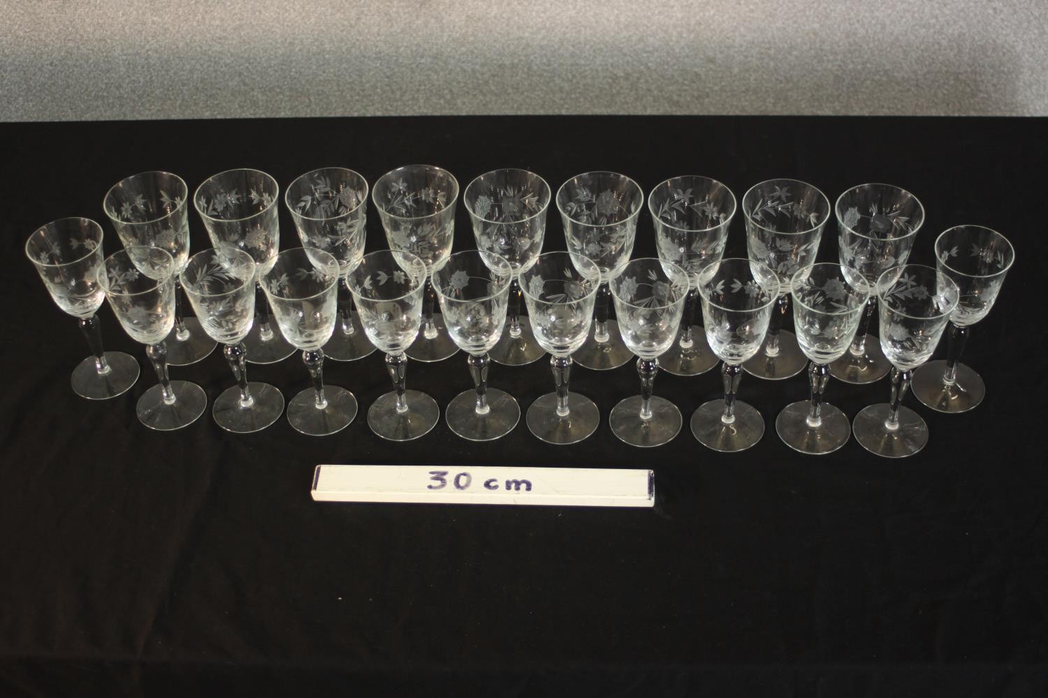 A collection of twenty one etched wine and sherry glasses with floral and foliate design, two - Image 2 of 7