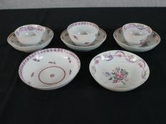 Three 19th century Chinese hand painted Famille Rose floral design tea bowls and saucers along
