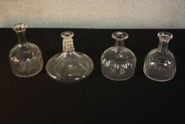 Four 19th century hand cut glass decanters of various forms. (no stoppers) H.23 Dia.15cm. (largest)