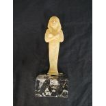 Egyptian style sandstone figure raised on plinth base, together with a terracotta Egyptian canopic