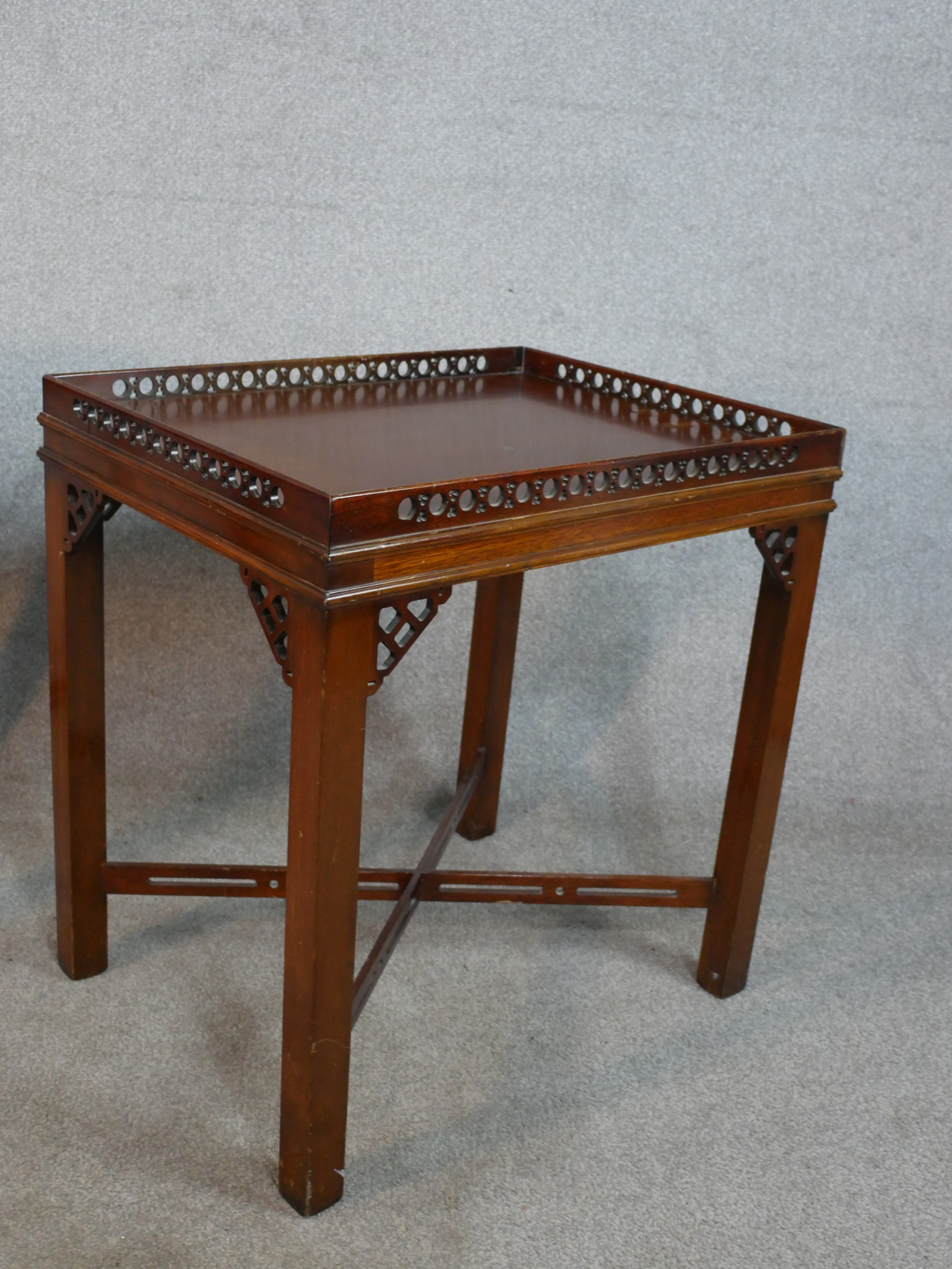 A pair of reporoduction mahogany lamp tables in Chippendale style, of rectangular form with a - Image 6 of 7