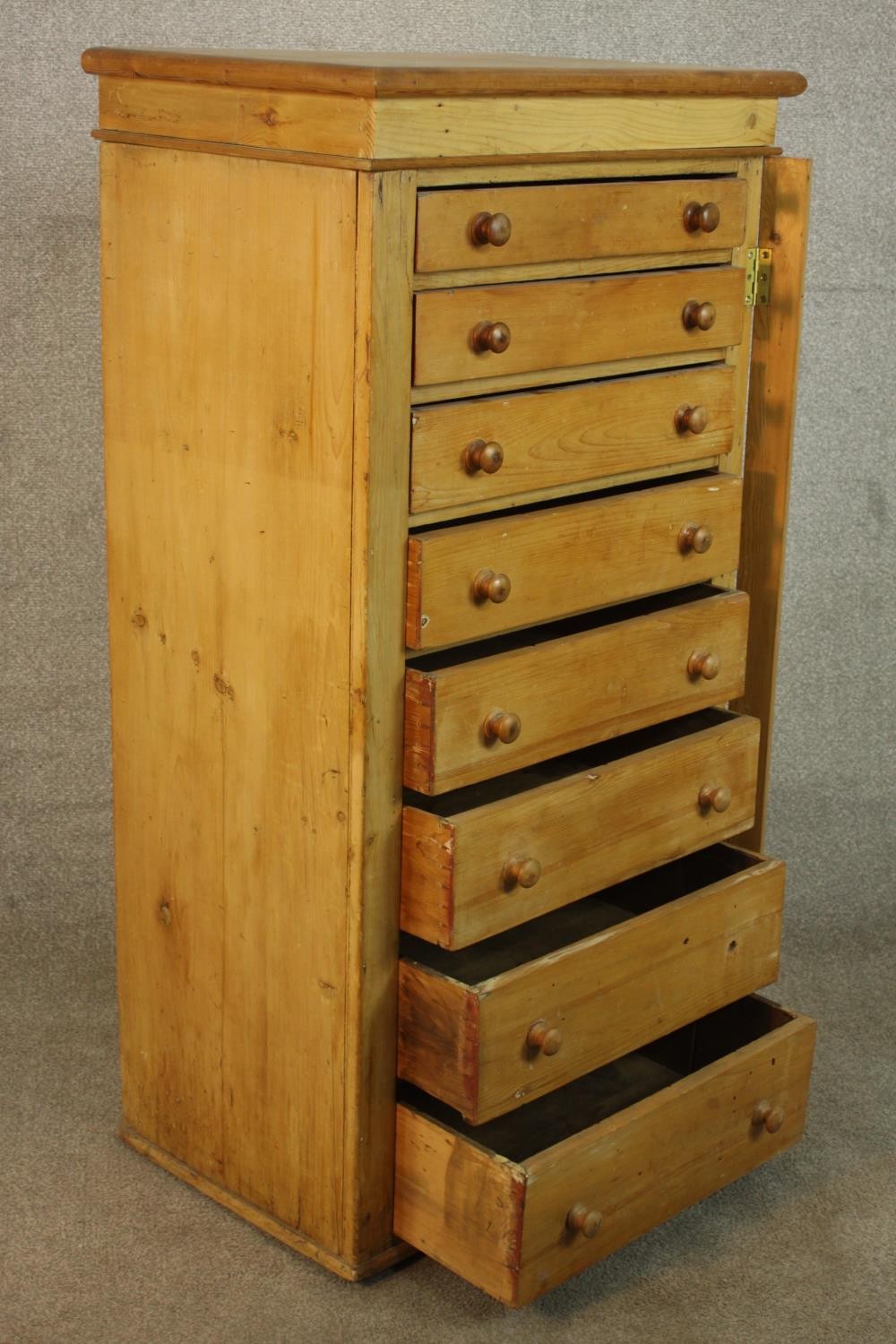 A C19th pine Wellington chest with locking stile, the eight graduated drawers with knob handles. H. - Image 4 of 6