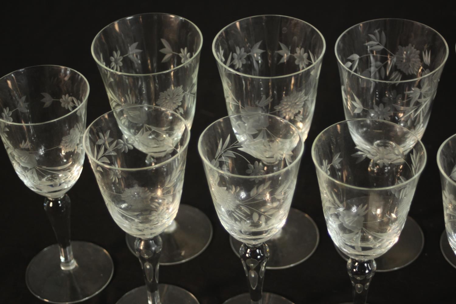 A collection of twenty one etched wine and sherry glasses with floral and foliate design, two - Image 4 of 7