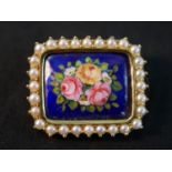 An Italian 18 carat yellow gold and enamel brooch, set with a border of twenty eight round