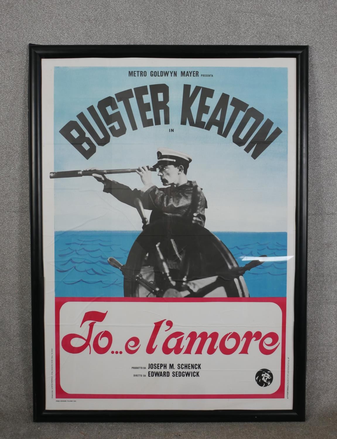 A framed reproduction coloured filmed poster, Buster Keaton El'Amore. H.147.5 W.108cm - Image 2 of 6