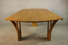 Attributed to Robert Williams (b.1942) for Pearl Dot, Islington, an oak dining table, circa 1980s,