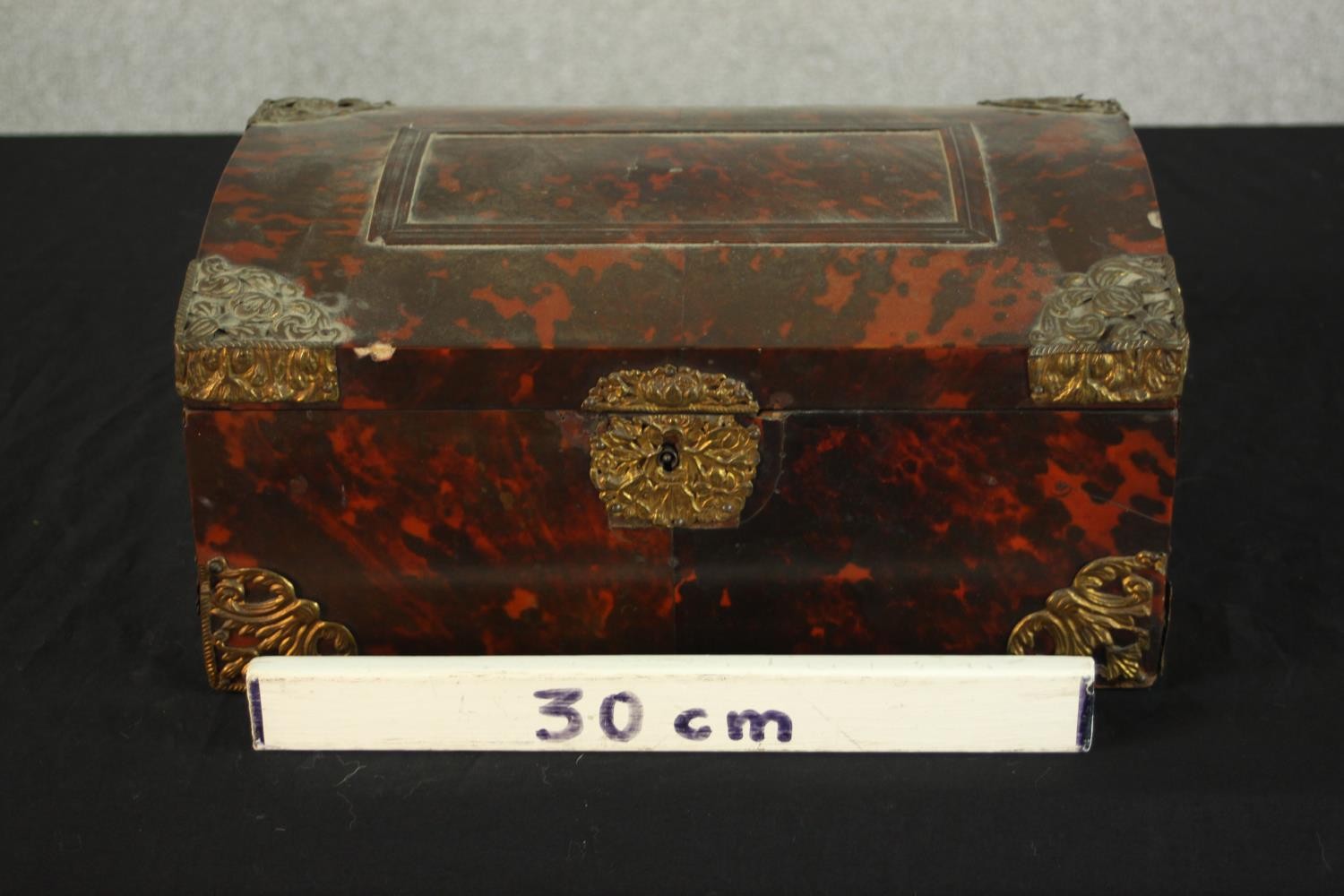 A 19th century tortoiseshell mounted dome topped box with brass mounts, opening to reveal velvet - Image 2 of 8