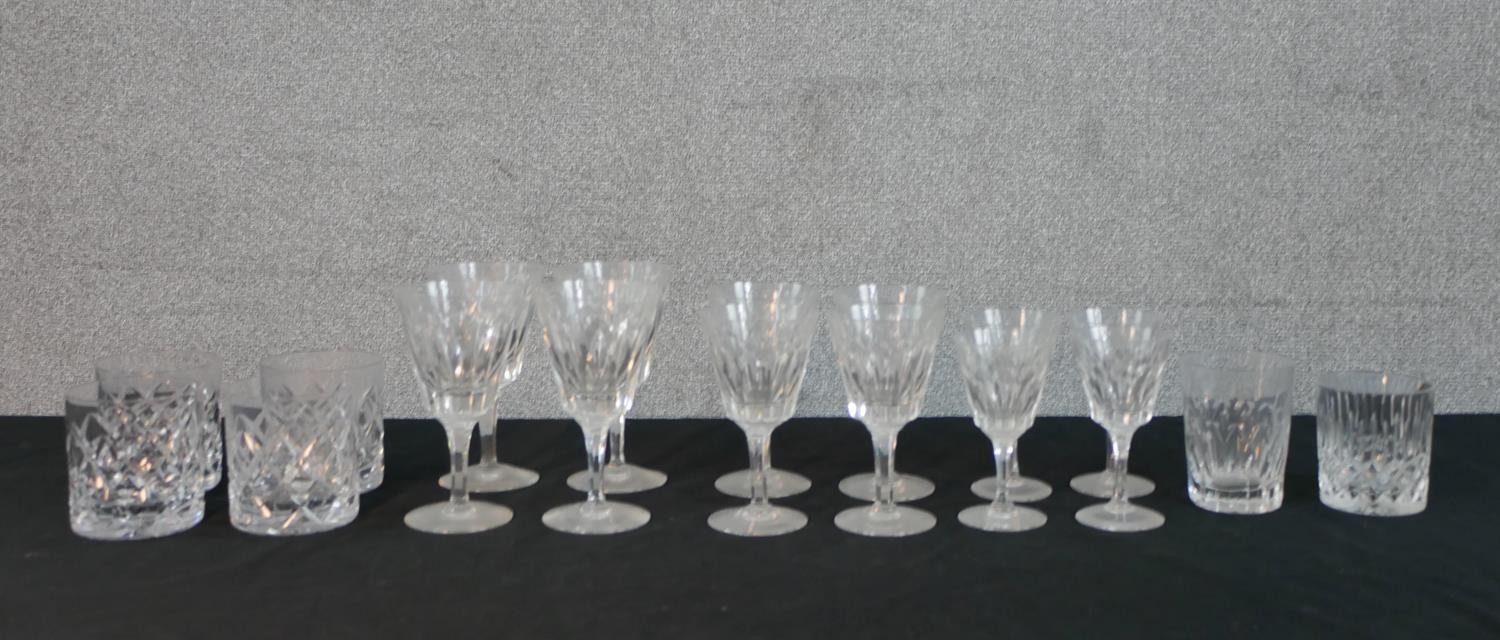A collection of eighteen Stuart cut crystal glasses, including a set of four whisky tumblers and