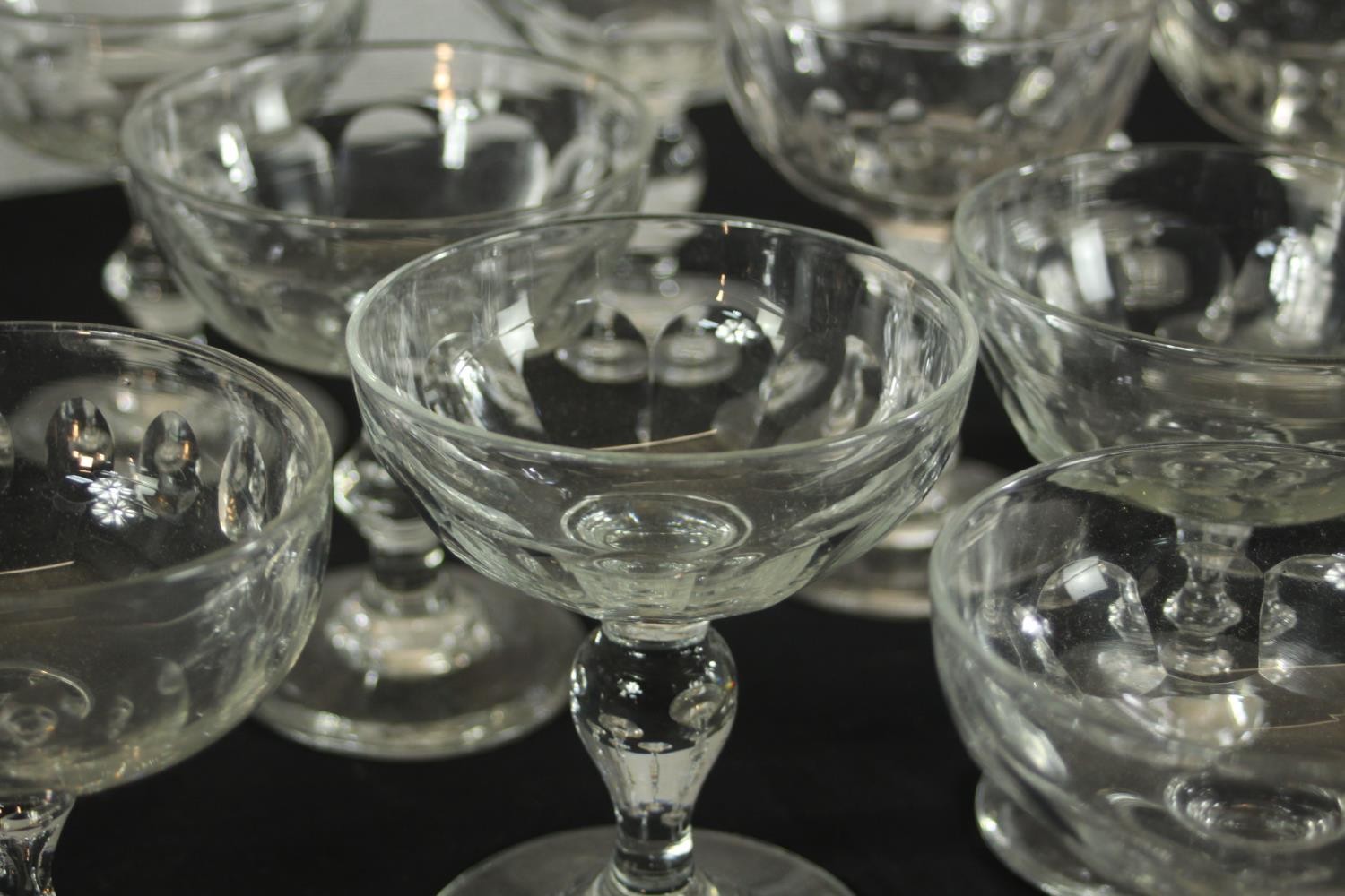 A set of thirteeen 20th century, possibly French martini glasses together with a clear glass ships - Image 3 of 9