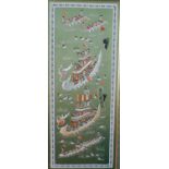 A 20th century Chinese embroidered silk panel depicting dragon boats on a green field, in a gilt